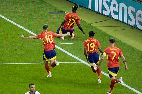 Nico Williams celebrates after scoring a goal against England